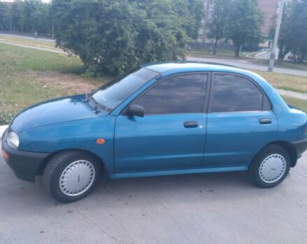 Синій Мазда 121, об'ємом двигуна 1.3 л та пробігом 240 тис. км за 2100 $, фото 1 на Automoto.ua