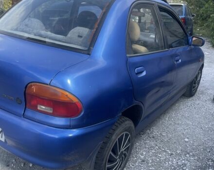 Синій Мазда 121, об'ємом двигуна 1.3 л та пробігом 230 тис. км за 1200 $, фото 1 на Automoto.ua
