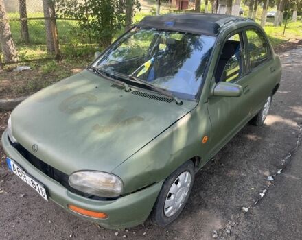 Зелений Мазда 121, об'ємом двигуна 1.3 л та пробігом 220 тис. км за 29500 $, фото 1 на Automoto.ua