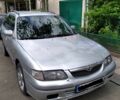 Мазда 131 1999 у Мукачеве на Automoto.ua Сірий Мазда 131, об'ємом двигуна 2 л та пробігом 440 тис. км за 2350 $, фото 7 на Automoto.ua
