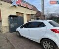 Белый Мазда 2, объемом двигателя 1.4 л и пробегом 100 тыс. км за 4800 $, фото 4 на Automoto.ua