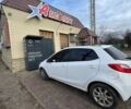 Белый Мазда 2, объемом двигателя 1.4 л и пробегом 230 тыс. км за 4100 $, фото 4 на Automoto.ua