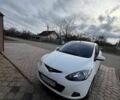 Белый Мазда 2, объемом двигателя 1.4 л и пробегом 230 тыс. км за 4100 $, фото 1 на Automoto.ua