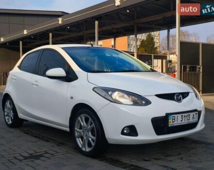 Белый Мазда 2, объемом двигателя 1.5 л и пробегом 165 тыс. км за 5200 $, фото 4 на Automoto.ua