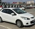 Білий Мазда 2, об'ємом двигуна 1.4 л та пробігом 240 тис. км за 4800 $, фото 1 на Automoto.ua