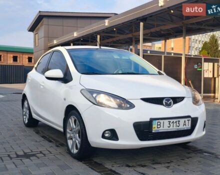 Белый Мазда 2, объемом двигателя 1.5 л и пробегом 165 тыс. км за 5200 $, фото 9 на Automoto.ua
