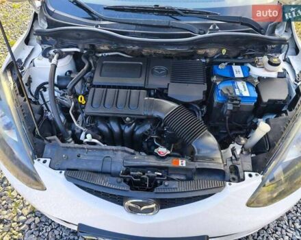 Білий Мазда 2, об'ємом двигуна 1.5 л та пробігом 165 тис. км за 5550 $, фото 7 на Automoto.ua