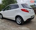 Белый Мазда 2, объемом двигателя 1.5 л и пробегом 125 тыс. км за 5800 $, фото 2 на Automoto.ua