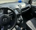 Білий Мазда 2, об'ємом двигуна 1.4 л та пробігом 240 тис. км за 4800 $, фото 4 на Automoto.ua