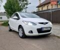 Белый Мазда 2, объемом двигателя 1.5 л и пробегом 125 тыс. км за 5800 $, фото 1 на Automoto.ua
