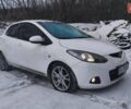 Білий Мазда 2, об'ємом двигуна 1.5 л та пробігом 170 тис. км за 5500 $, фото 1 на Automoto.ua