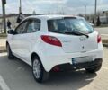Білий Мазда 2, об'ємом двигуна 1.4 л та пробігом 240 тис. км за 4800 $, фото 1 на Automoto.ua