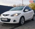 Белый Мазда 2, объемом двигателя 1.5 л и пробегом 165 тыс. км за 5200 $, фото 1 на Automoto.ua