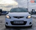 Білий Мазда 2, об'ємом двигуна 1.5 л та пробігом 165 тис. км за 5500 $, фото 1 на Automoto.ua