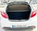 Білий Мазда 2, об'ємом двигуна 1.4 л та пробігом 240 тис. км за 4800 $, фото 3 на Automoto.ua
