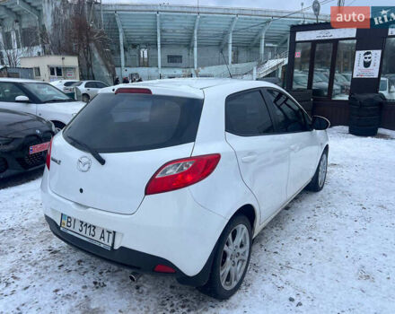 Білий Мазда 2, об'ємом двигуна 1.5 л та пробігом 170 тис. км за 5800 $, фото 6 на Automoto.ua