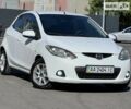 Білий Мазда 2, об'ємом двигуна 1.5 л та пробігом 124 тис. км за 6600 $, фото 10 на Automoto.ua