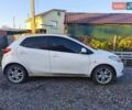 Білий Мазда 2, об'ємом двигуна 1.5 л та пробігом 165 тис. км за 5550 $, фото 4 на Automoto.ua