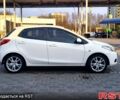 Білий Мазда 2, об'ємом двигуна 1.5 л та пробігом 170 тис. км за 5300 $, фото 4 на Automoto.ua