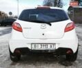 Білий Мазда 2, об'ємом двигуна 1.5 л та пробігом 165 тис. км за 5500 $, фото 7 на Automoto.ua