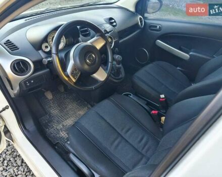 Білий Мазда 2, об'ємом двигуна 1.5 л та пробігом 165 тис. км за 5550 $, фото 8 на Automoto.ua