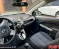 Білий Мазда 2, об'ємом двигуна 1.5 л та пробігом 250 тис. км за 5150 $, фото 1 на Automoto.ua