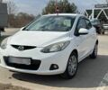 Білий Мазда 2, об'ємом двигуна 1.4 л та пробігом 240 тис. км за 4800 $, фото 8 на Automoto.ua