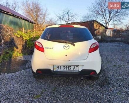 Білий Мазда 2, об'ємом двигуна 1.5 л та пробігом 165 тис. км за 5550 $, фото 2 на Automoto.ua