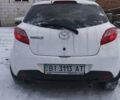 Білий Мазда 2, об'ємом двигуна 1.5 л та пробігом 170 тис. км за 5500 $, фото 3 на Automoto.ua