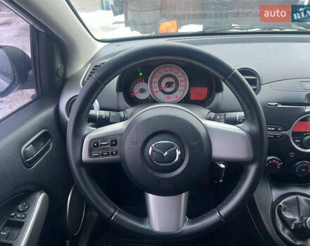 Білий Мазда 2, об'ємом двигуна 1.5 л та пробігом 170 тис. км за 5800 $, фото 19 на Automoto.ua