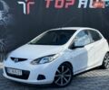 Білий Мазда 2, об'ємом двигуна 1.4 л та пробігом 245 тис. км за 4300 $, фото 2 на Automoto.ua