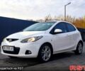 Білий Мазда 2, об'ємом двигуна 1.5 л та пробігом 170 тис. км за 5200 $, фото 1 на Automoto.ua