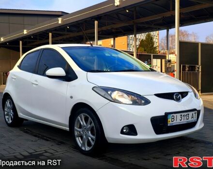 Білий Мазда 2, об'ємом двигуна 1.5 л та пробігом 170 тис. км за 5300 $, фото 5 на Automoto.ua