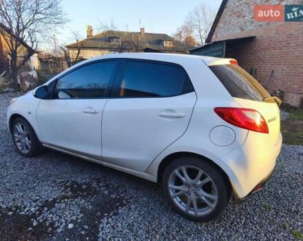 Білий Мазда 2, об'ємом двигуна 1.5 л та пробігом 165 тис. км за 5550 $, фото 1 на Automoto.ua