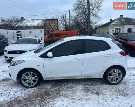 Білий Мазда 2, об'ємом двигуна 1.5 л та пробігом 170 тис. км за 5800 $, фото 3 на Automoto.ua