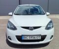 Белый Мазда 2, объемом двигателя 1.5 л и пробегом 126 тыс. км за 6600 $, фото 1 на Automoto.ua