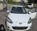 Білий Мазда 2, об'ємом двигуна 1.5 л та пробігом 80 тис. км за 5228 $, фото 1 на Automoto.ua