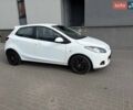 Білий Мазда 2, об'ємом двигуна 1.5 л та пробігом 81 тис. км за 6700 $, фото 1 на Automoto.ua