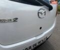 Білий Мазда 2, об'ємом двигуна 1.5 л та пробігом 81 тис. км за 6700 $, фото 27 на Automoto.ua