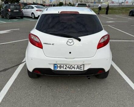 Білий Мазда 2, об'ємом двигуна 1.5 л та пробігом 135 тис. км за 7654 $, фото 5 на Automoto.ua