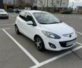 Білий Мазда 2, об'ємом двигуна 1.5 л та пробігом 135 тис. км за 7654 $, фото 1 на Automoto.ua