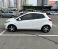 Білий Мазда 2, об'ємом двигуна 1.5 л та пробігом 135 тис. км за 7654 $, фото 2 на Automoto.ua