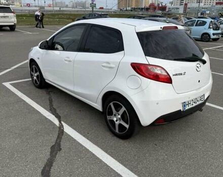 Білий Мазда 2, об'ємом двигуна 1.5 л та пробігом 135 тис. км за 7654 $, фото 4 на Automoto.ua