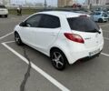Білий Мазда 2, об'ємом двигуна 1.5 л та пробігом 135 тис. км за 7654 $, фото 4 на Automoto.ua