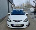 Белый Мазда 2, объемом двигателя 1.4 л и пробегом 121 тыс. км за 5500 $, фото 1 на Automoto.ua