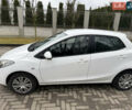 Білий Мазда 2, об'ємом двигуна 1.4 л та пробігом 221 тис. км за 5000 $, фото 4 на Automoto.ua