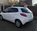 Белый Мазда 2, объемом двигателя 1.5 л и пробегом 164 тыс. км за 6400 $, фото 2 на Automoto.ua