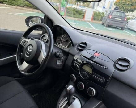 Білий Мазда 2, об'ємом двигуна 1.5 л та пробігом 135 тис. км за 7654 $, фото 12 на Automoto.ua
