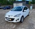 Белый Мазда 2, объемом двигателя 1.4 л и пробегом 148 тыс. км за 5350 $, фото 1 на Automoto.ua