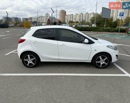 Білий Мазда 2, об'ємом двигуна 1.5 л та пробігом 135 тис. км за 7654 $, фото 1 на Automoto.ua